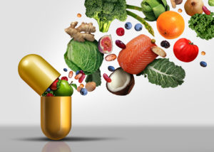 Vitamins supplements as a capsule with fruit vegetables nuts and beans inside a nutrient pill as a natural medicine health treatment with 3D illust...