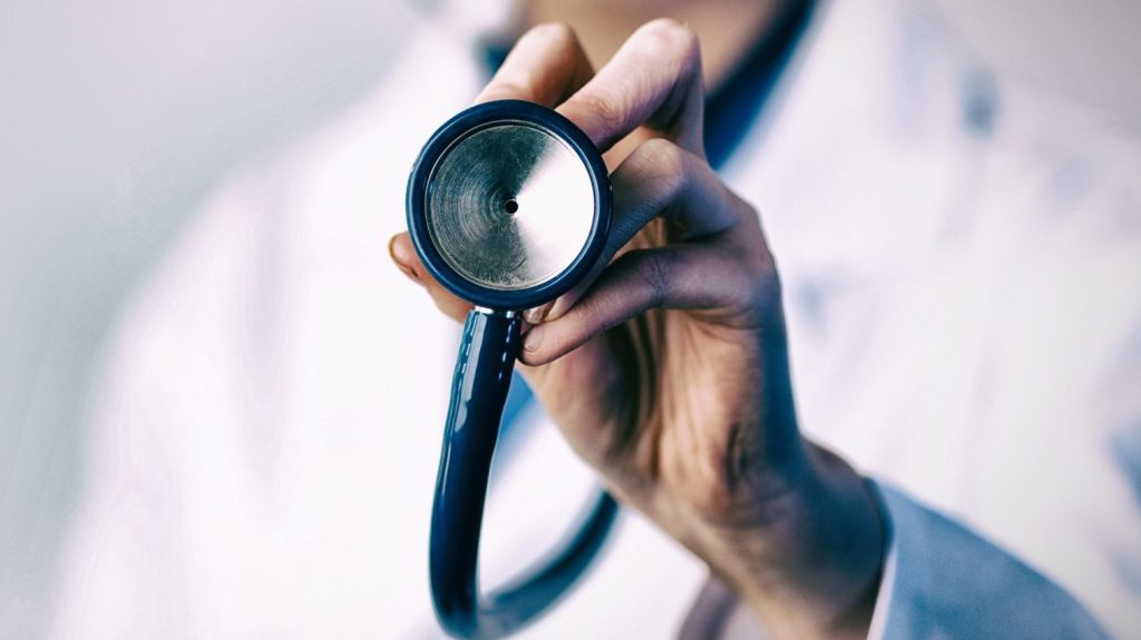 Doctor Holding Stethoscope