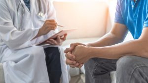 Men’S Health Exam With Doctor Or Psychiatrist Working With Patie