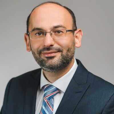 Portrait of M. Adham Salkeni, MD, FRCPC