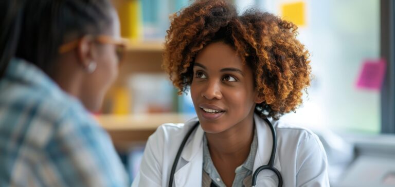 Female doctor consulting with a patient in a modern medical office. Healthcare professional providing medical advice and support.